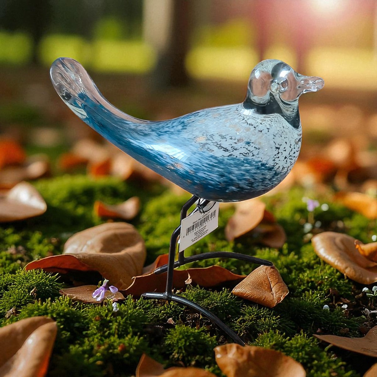 Staande massief glazen vogel blauw